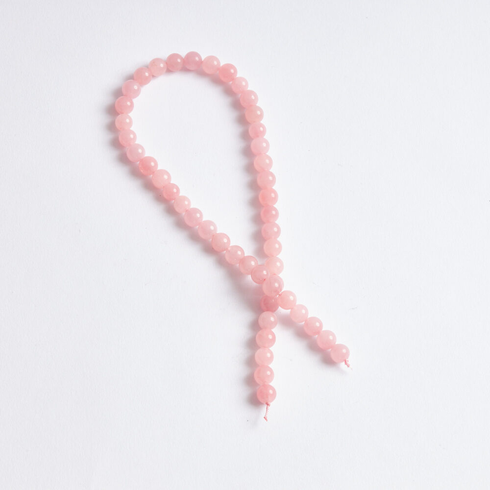Pembe Kuvars koyu 8mm AB dizi taşların arka yüzü.