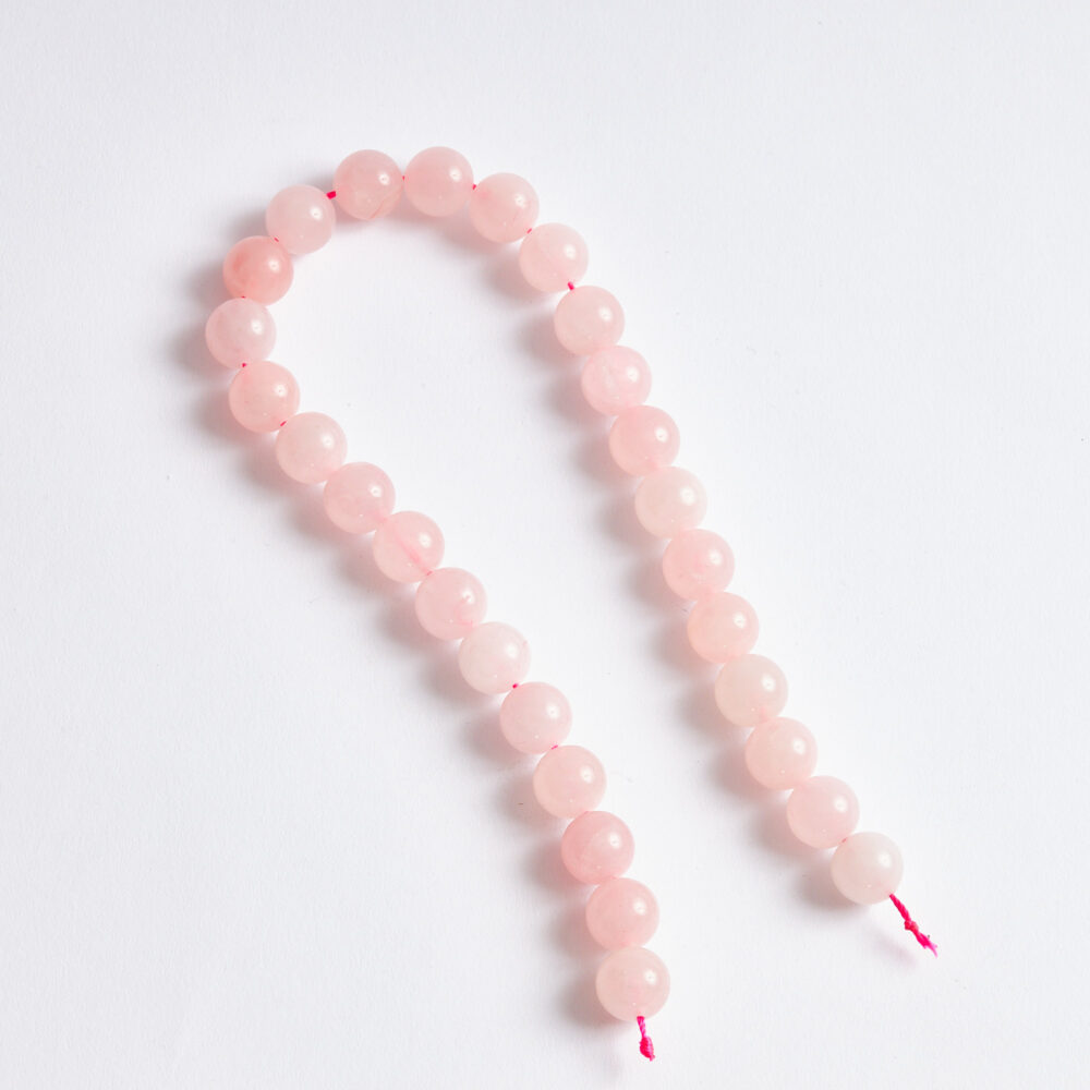 Pembe Kuvars 14mm küre dizi taşların arka yüzü.