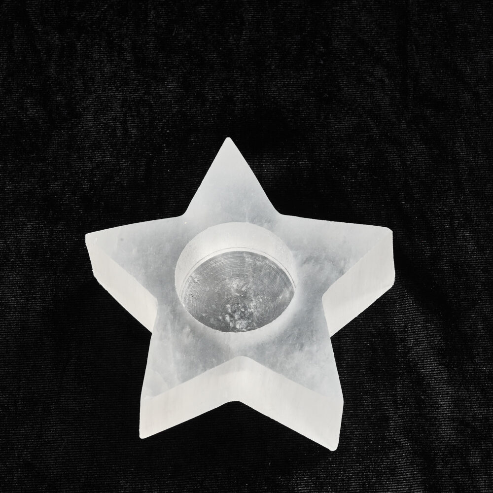 Selenite star tealight holder 4 cm, yakın plan doku.